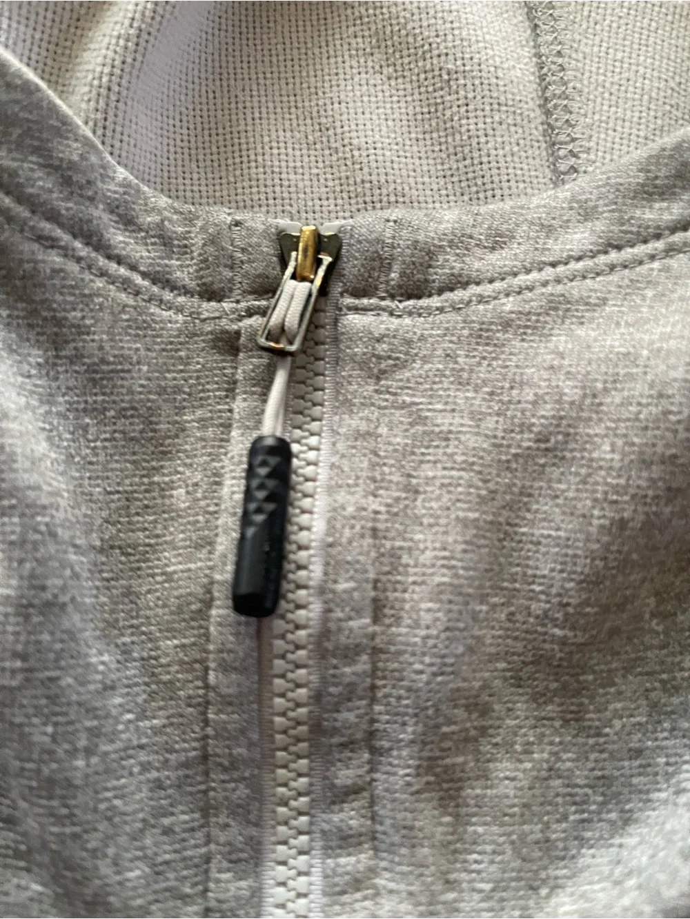 The North Face Men's Hooded Lightweight Jacket in Light Gray with Orange Accents